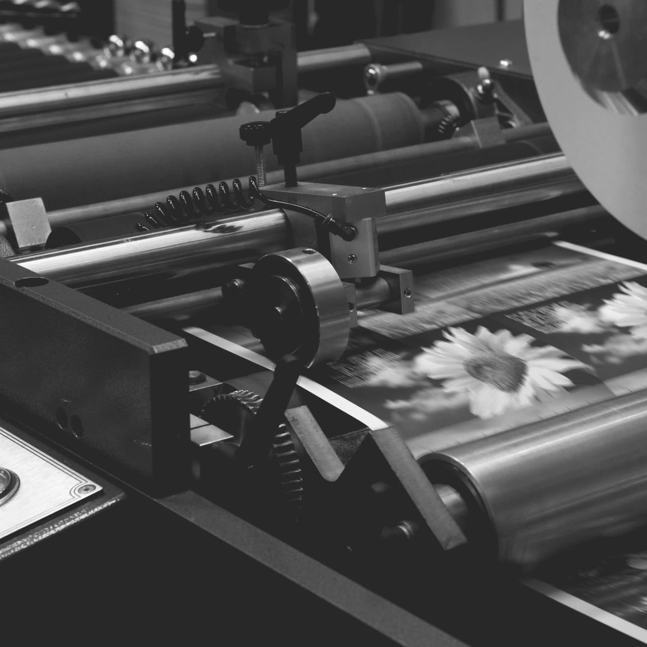 Small printing and finishing machine in black and white